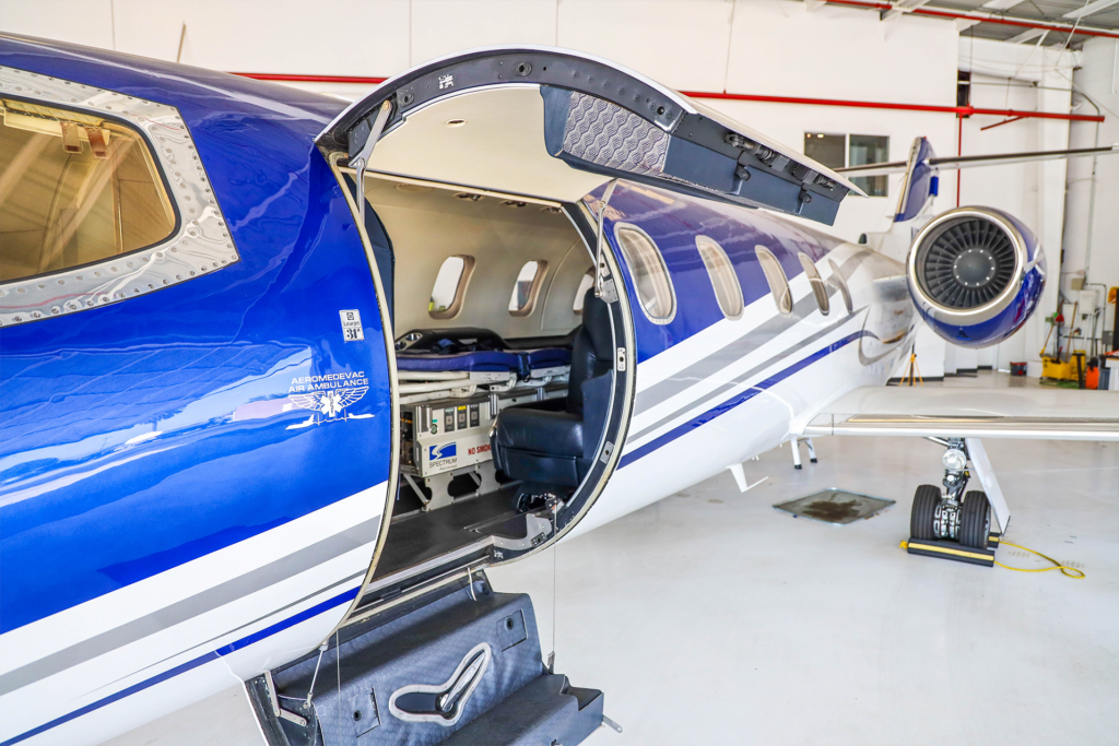 Blue aircraft with open hatch
